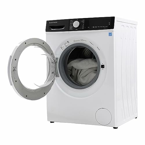 Front-load washing machine with open door.