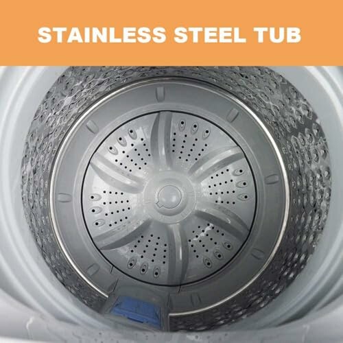 Interior view of a stainless steel washing machine tub