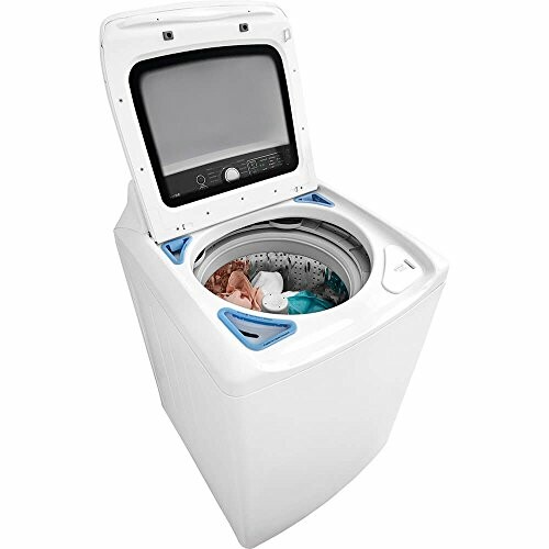 Top-load washing machine with open lid and clothes inside